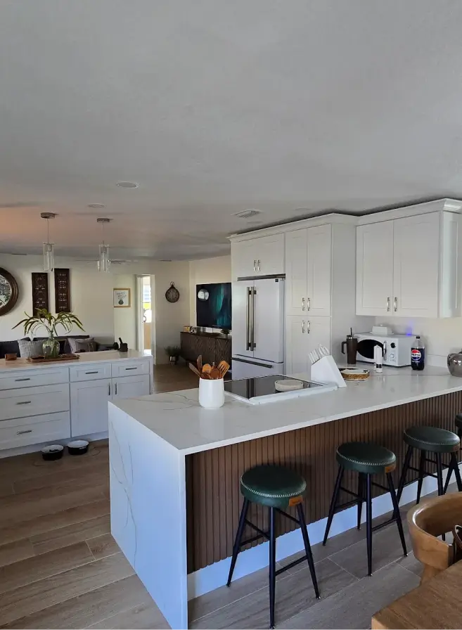 Happy-D&S-Kitchen-client-reviewing-cabinet-installation